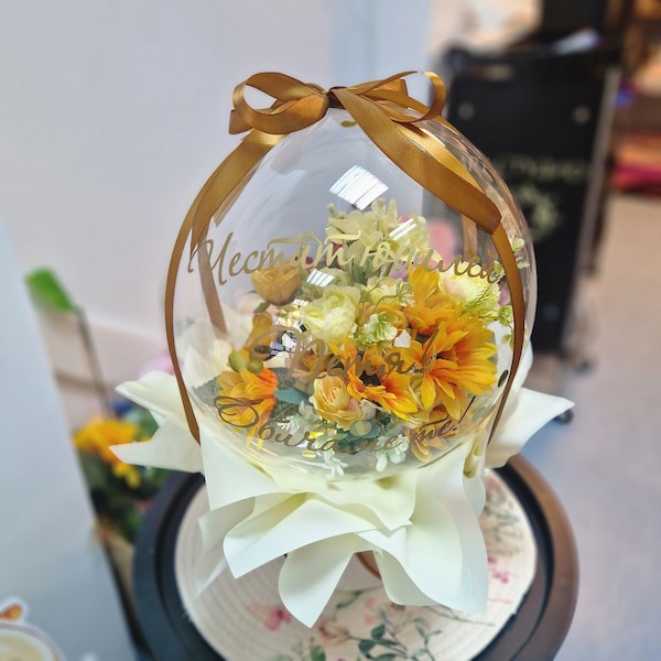 Букет в балон със слънчогледи